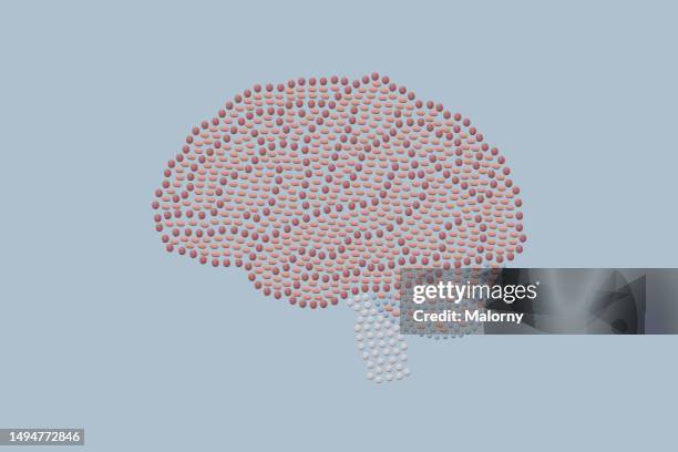 pills in the shape of a human brain. - cerebral atrophy stock pictures, royalty-free photos & images