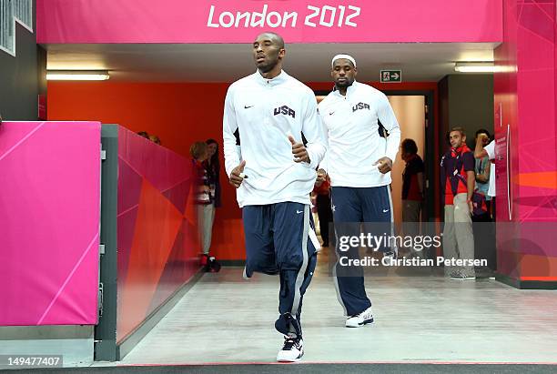 Kobe Bryant and Lebron James of United States run out from the locker room prior to their Men's Basketball Game against France on Day 2 of the London...
