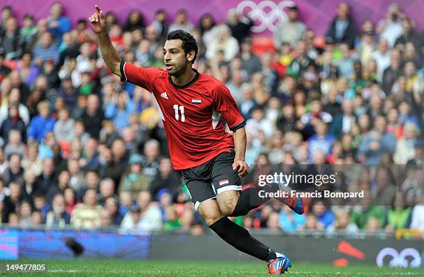 Mohamed Salah of Egypt celebrates scoring a goal during the Men's Football first round Group C Match between Egypt and New Zealand on Day 2 of the...