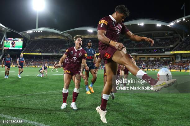 Selwyn Cobbo of the Maroons celebrates scoring a try during game one of the 2023 State of Origin series between the Queensland Maroons and New South...