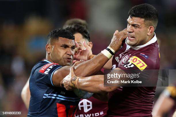 Tevita Pangai Junior of the Blues runs at David Fifita of the Maroons during game one of the 2023 State of Origin series between the Queensland...