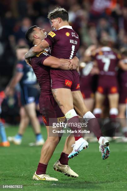 David Fifita and s of the Maroons celebrate a try by team mate Cameron Munster of the Maroons during game one of the 2023 State of Origin series...