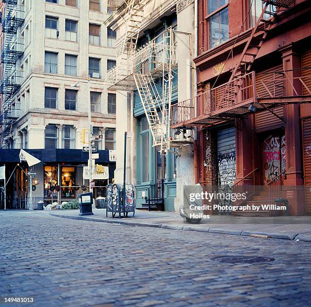 mercer street in morning - cobblestone sidewalk stock pictures, royalty-free photos & images