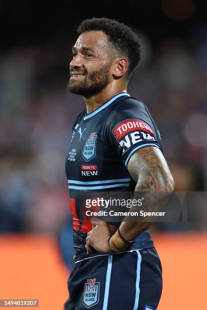 Apisai Koroisau of the Blues reacts during game one of the 2023 State of Origin series between the Queensland Maroons and New South Wales Blues at...