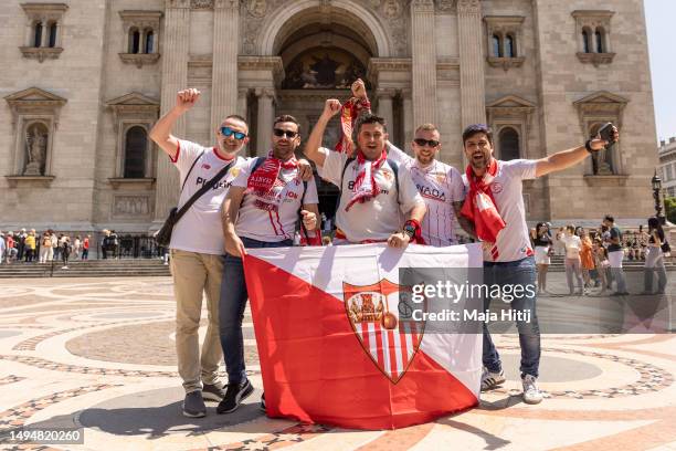 Fans of Sevilla celebrate near the Szent István-bazilika prior to the UEFA Europa League 2022/23 final match between Sevilla FC and AS Roma on May...