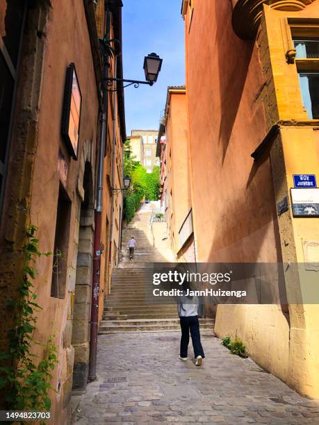 lyon, france: people climbing montée du change staircase, vieux lyon - rhone stock pictures, royalty-free photos & images