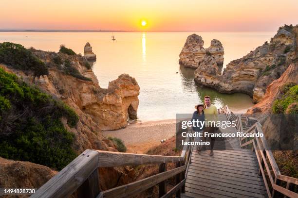 sunrise in algarve, portugal. camilo beach - iacomino portugal stock-fotos und bilder