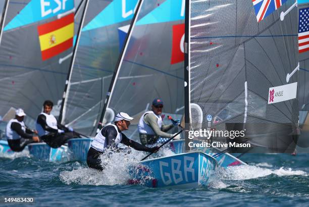 Ben Ainslie of Great Britain in action during the first Finn Class race of the London 2012 Olympic Games at the Weymouth & Portland Venue at Weymouth...
