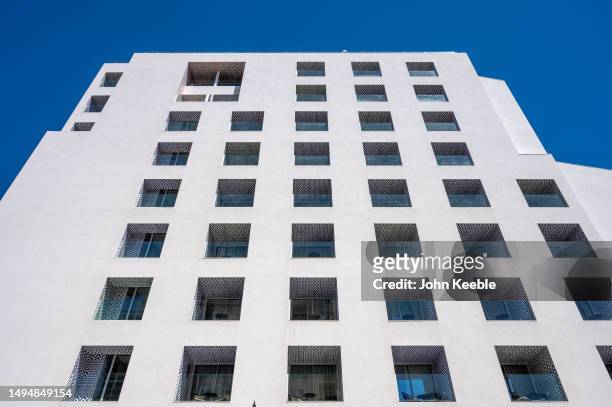General exterior view of the H10 Croma Malaga Hotel showing its geometric patterned tiled balconies on April 18, 2023 in Malaga, Spain.