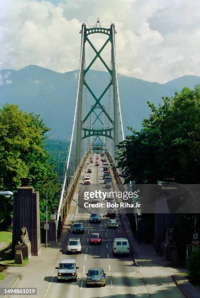 Vehicles drive towards Vancouver over the Lions Gate Bridge, July 15, 1995 in Vancouver, British Columbia, Canada.