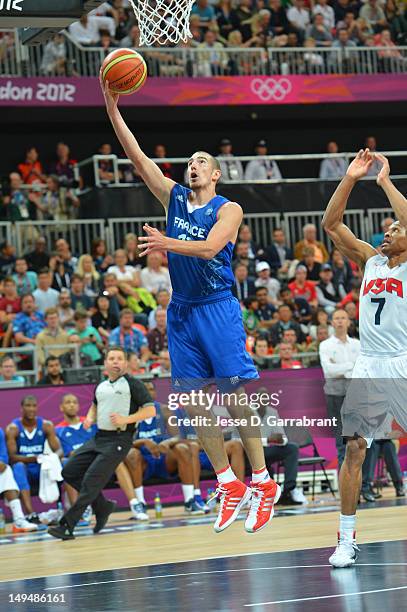 Nando De Colo of France shoots against the USA Mens Senior National team at the Olympic Park Basketball Arena during the London Olympic Games on July...