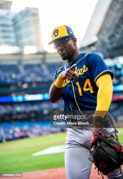 Andruw Monasterio of the Milwaukee Brewers walks to the dugout before playing the Toronto Blue Jays in their MLB game at the Rogers Centre on May 30,...