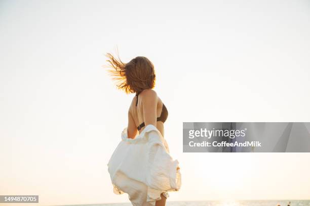 relaxing girl - beach glamour stock pictures, royalty-free photos & images