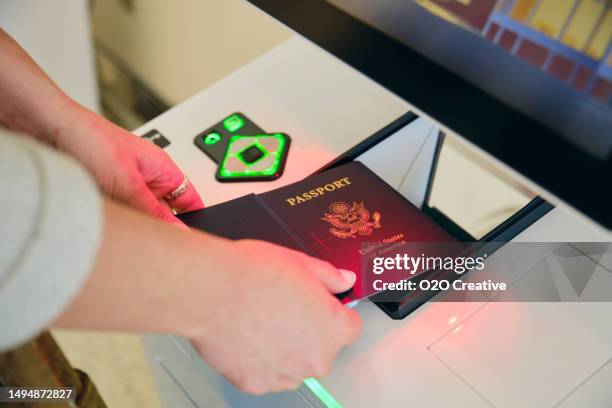 airport check-in kiosk with passport - airport passport stock pictures, royalty-free photos & images