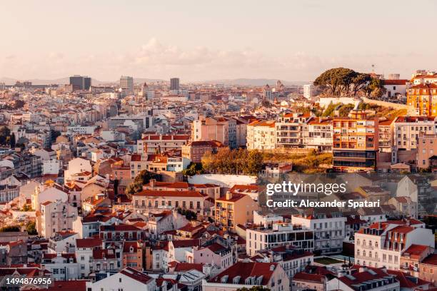 lisbon cityscape at sunset, portugal - house golden hour stock pictures, royalty-free photos & images