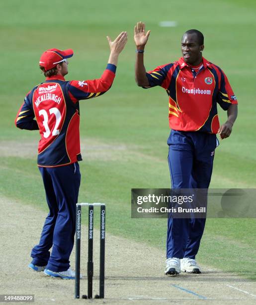 Maurice Chambers of Essex is congratulated by team-mate Jaik Mickleburgh after dismissing Moeen Ali of Worcestershire during the Clydesdale Bank...