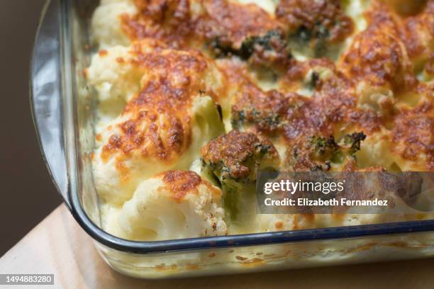 baked cauliflower and broccoli with grated parmesan - baking pan stock pictures, royalty-free photos & images