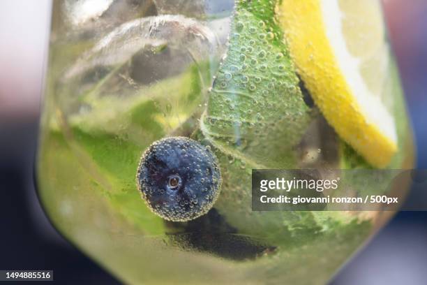 close-up of drink in glass,provincia autonoma di trento,italy - provincia di trento stock-fotos und bilder