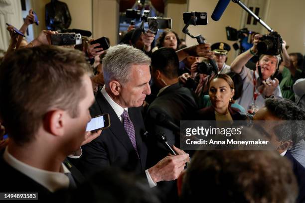 Speaker of the House Kevin McCarthy speaks to reporters as he walks off the floor of the House Chambers on May 31, 2023 in Washington, DC. The House...