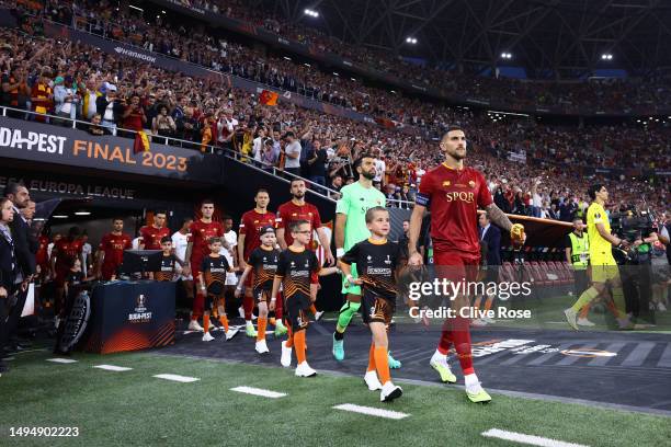 Lorenzo Pellegrini of AS Roma leads the team out prior to the UEFA Europa League 2022/23 final match between Sevilla FC and AS Roma at Puskas Arena...