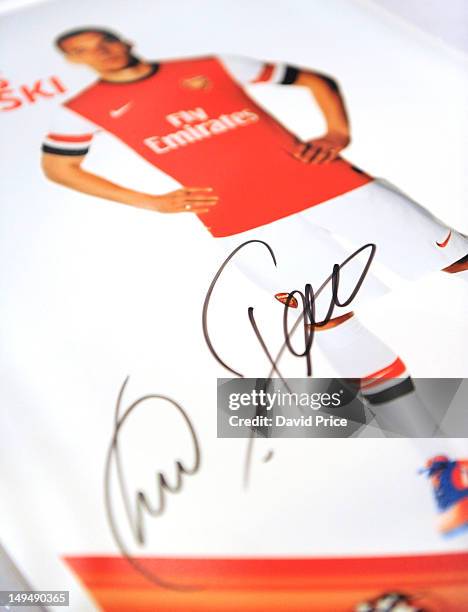 Lukas Podolski of Arsenal FC's autograph adorns a poster at an Airtel promotional activity on July 29, 2012 in Lagos, Nigeria.