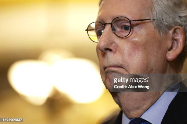 Senate Minority Leader Sen. Mitch McConnell listens during a news briefing after a weekly Republican policy luncheon at the U.S. Capitol on May 31,...