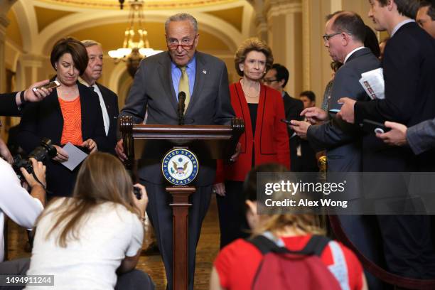 Senate Majority Leader Sen. Chuck Schumer speaks as Sen. Amy Klobuchar , Senate Majority Whip Sen. Richard Durbin , and Sen. Debbie Stabenow listen...