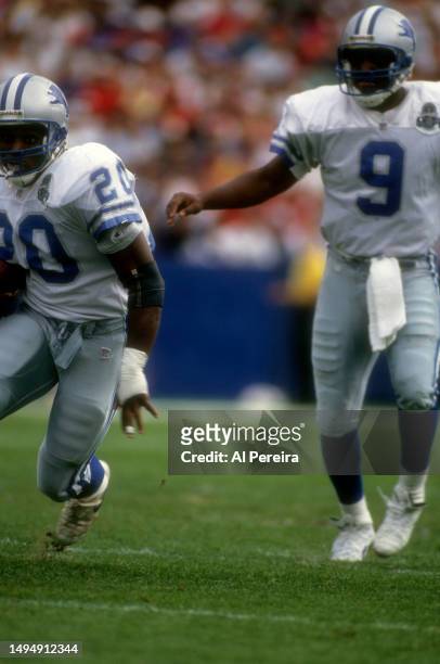 Running Back Barry Sanders of the Detroit Lions has a short gain in the game between the Detroit Lions vs the New England Patriots at Foxboro Stadium...