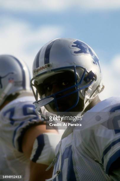 Running Back Barry Sanders of the Detroit Lions follows the action in the game between the Detroit Lions vs the New England Patriots at Foxboro...
