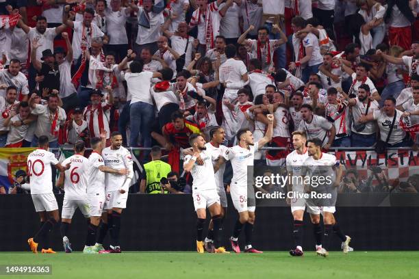 Players of Sevilla FC celebrate after Gianluca Mancini of AS Roma concedes an own goal, the first goal for Sevilla FC, during the UEFA Europa League...