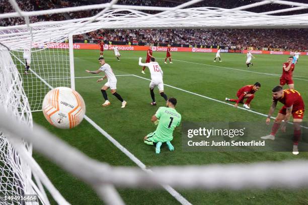 Gianluca Mancini of AS Roma reacts after scoring an own goal, Sevilla FC's first goal during the UEFA Europa League 2022/23 final match between...