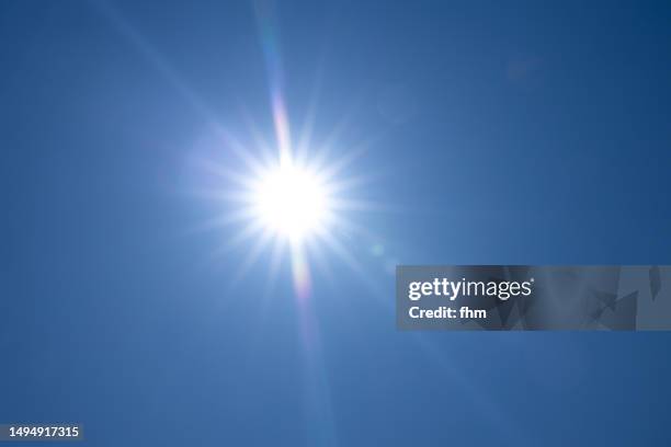 Sun In Blue 13,624 Blue Sky Sun Flare Stock Photos, High-Res Pictures, and Images ...