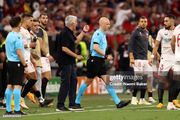 Jose Mourinho, Head Coach of AS Roma, reacts towards Referee Anthony Taylor during the UEFA Europa League 2022/23 final match between Sevilla FC and...