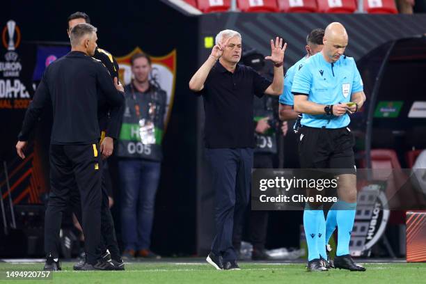 Jose Mourinho, Head Coach of AS Roma, reacts after Salvatore Foti, Assistant Coach of AS Roma, receives a yellow card from Referee Anthony Taylor...