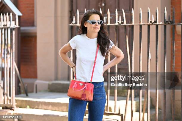 Katie Holmes out in New York City carrying a Prada Galleria handbag on May 31, 2023 in New York City.