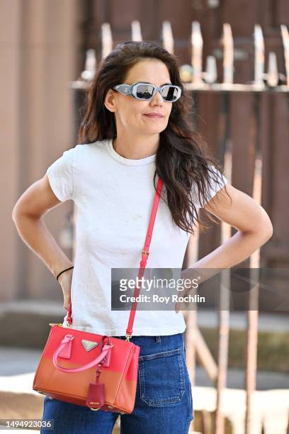 Katie Holmes out in New York City carrying a Prada Galleria handbag on May 31, 2023 in New York City.