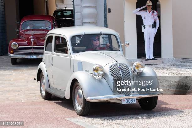 Princess Caroline of Hanover paraded in vintage cars as part of the celebrations to mark the birth of the late Rainer III, on May 31, 2023 in Monaco.