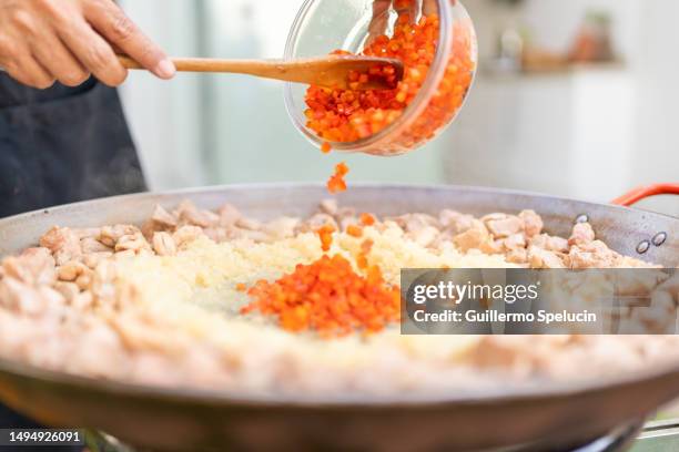 Paella Rice Adding 519 14052023 Stock Photos, High-Res Pictures, and Images - Getty Images