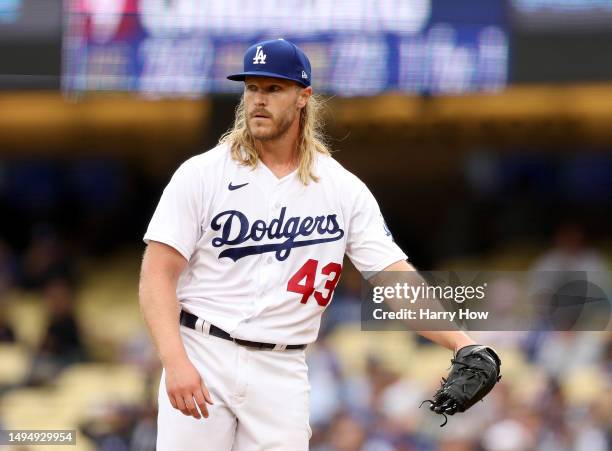 Noah Syndergaard of the Los Angeles Dodgers reacts after a two run homerun from Jeimer Candelario of the Washington Nationals, for a 5-4 Nationals...