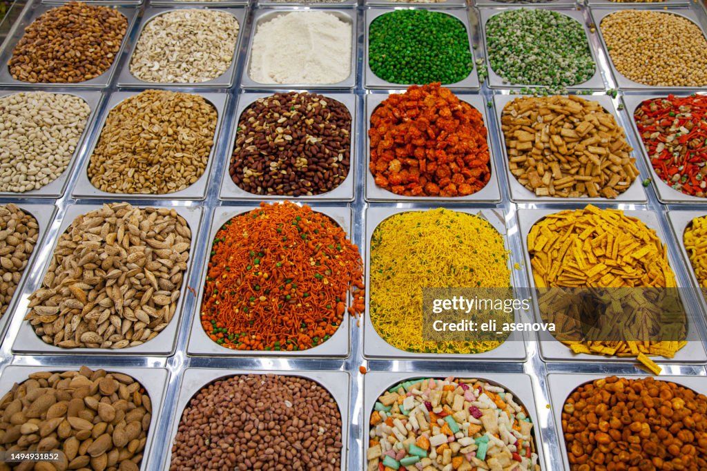 Dried fruits and nuts, boxes with colorful various assortment of vegetarian healthy dry fruits