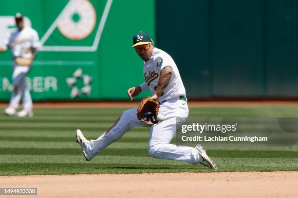 Jace Peterson of the Oakland Athletics fields the ball in the top of the seventh inning against the Atlanta Braves at RingCentral Coliseum on May 31,...