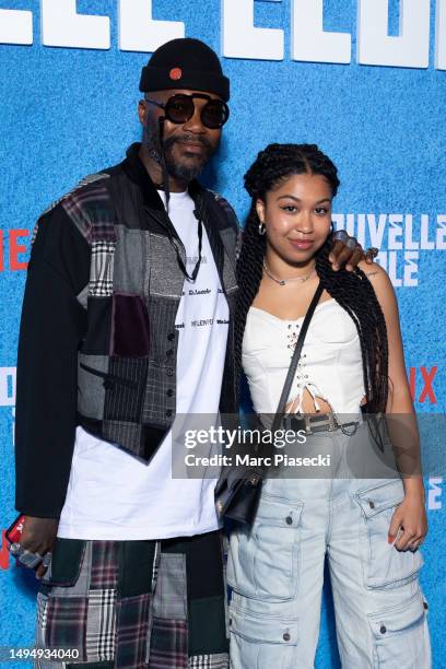 Djibril Cisse and a guest attend the "Nouvelle Ecole 2 - Netflix Party Celebration" photocall at Theatre National de Chaillot on May 31, 2023 in...