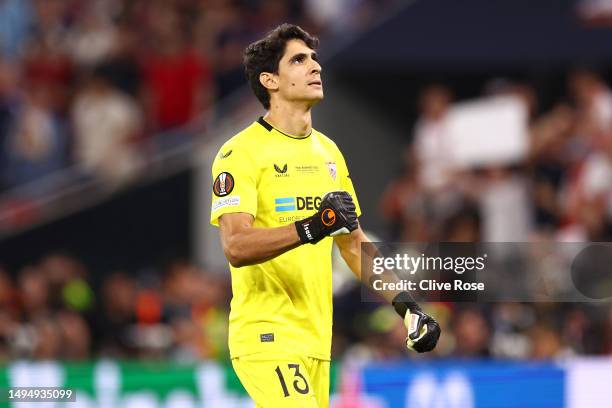 Yassine Bounou of Sevilla FC celebrates after saving the third penalty from Roger Ibanez of AS Roma in the penalty shoot out during the UEFA Europa...