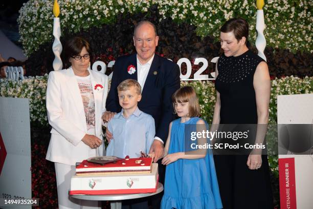 Princess Stephanie of Monaco, Prince Jacques of Monaco, Prince Albert II of Monaco, Princess Gabriella of Monaco and Princess Charlene of Monaco cut...