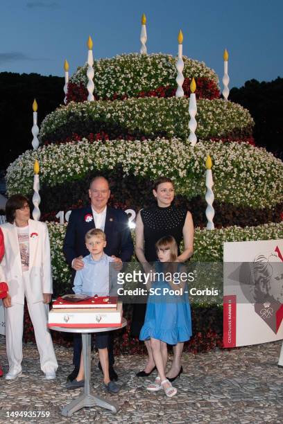 Princess Stephanie of Monaco, Prince Jacques of Monaco, Prince Albert II of Monaco, Princess Gabriella of Monaco and Princess Charlene of Monaco cut...
