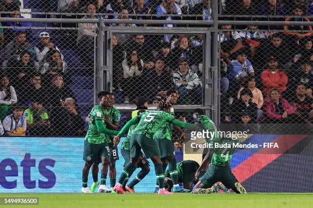 Ibrahim Muhammad of Nigeria celebrates with his teammates after scoring the team's first goal during the FIFA U-20 World Cup Argentina 2023 Round of...