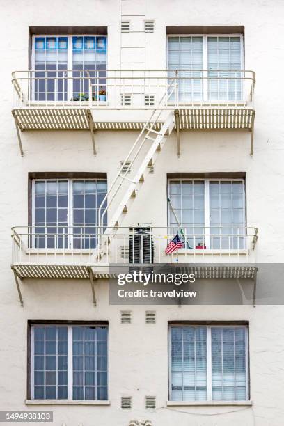 facade of old house with iron balconies and fire ladder to enable rescue activities in case of house fire in San Francisco