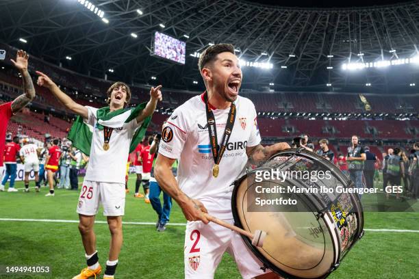 Gonzalo Montiel of Sevilla celebrates victory with a big drum after the UEFA Europa League 2022/23 final match between Sevilla FC and AS Roma at...