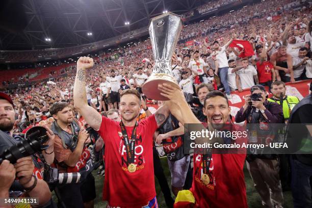 Ivan Rakitic of Sevilla FC and Jesus Navas celebrates with the UEFA Europa League trophy after the team's victory during the UEFA Europa League...