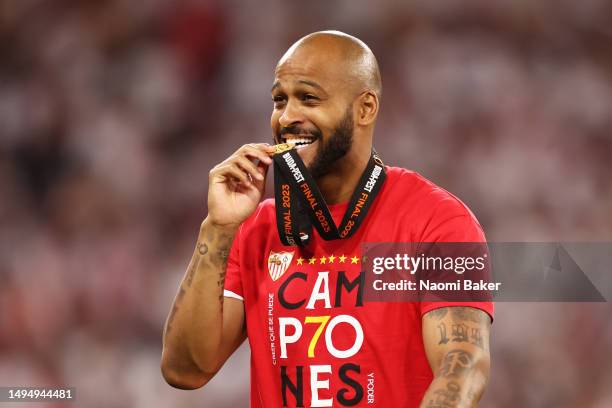 Marcao of Sevilla FC celebrates with his winners medal after his team victory during the UEFA Europa League 2022/23 final match between Sevilla FC...
